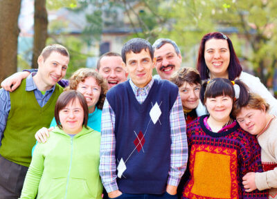 Group of happy people with disabilities